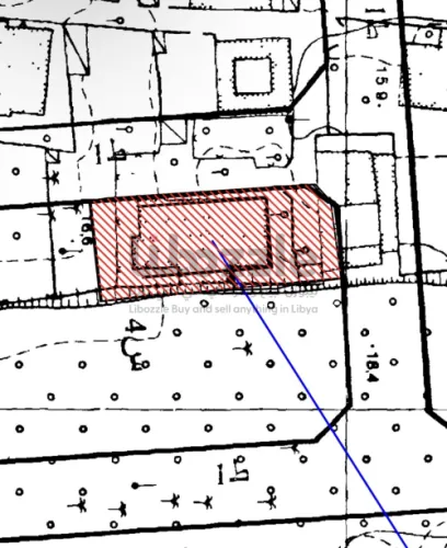 قطعة ارض ف 20 رمضان عليها عمارة بناء 2003