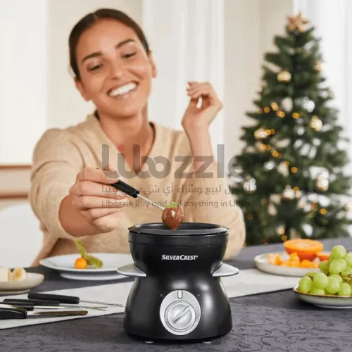 آلة    لتذويب الشوكولاتة