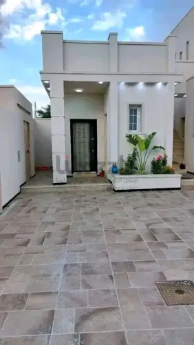 فيلا دور وملحق حديته ف تاجوراء المصانع شارع الظمان